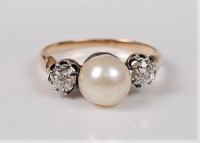 Lot 2699 - A cultured pearl and diamond ring, the central...