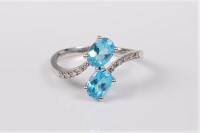 Lot 2708 - An 18ct white gold topaz and diamond 'toi et...