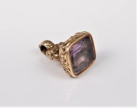 Lot 2713 - A gold plated fob, the fob with repouse and...