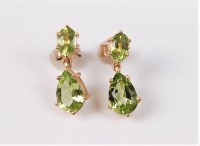 Lot 2722 - A pair of 9ct peridot earrings, the pear...
