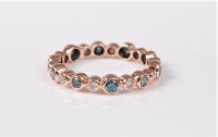 Lot 2735 - A bi-coloured diamond eternity ring, the...
