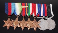 Lot 1007 - A WW II group of seven to include 1939-1945...