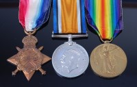 Lot 1031 - A WW I trio to include 1914-15 Star, British...