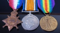 Lot 1035 - A WW I trio to include 1914-15 Star, British...