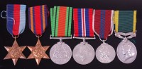 Lot 1038 - A group of six to include 1939-1945 Star,...