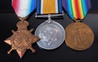 Lot 1043 - A WW I trio to include 1914-15 Star, British...