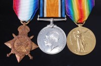 Lot 1045 - A WW I trio to include 1914-15 Star, naming SE....