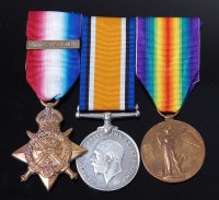 Lot 1053 - A WW I trio to include 1914 Mons Star with 5th...
