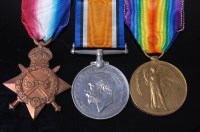 Lot 1060 - A WW I trio to include 1914-15 Star, British...