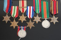 Lot 1139 - A WW II group of eight to include 1939-45 Star,...