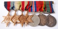 Lot 1204 - A WW II Naval group of seven to include...