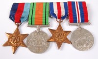 Lot 1215 - A WW II group of four to include 1939-45 Star,...