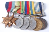 Lot 1261 - A WW II/Korea group of seven to include...