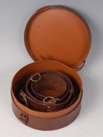 Lot 1317 - A brown leather Sam Browne belt, in a brown...