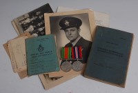 Lot 1371 - A WW II group of medals photographs and...