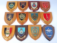 Lot 1403 - A collection of regimental wall plaques to...