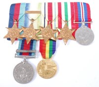 Lot 1416 - A WW II group of seven to include 1939-45 Star,...