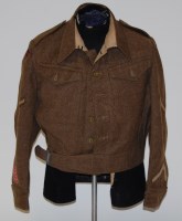 Lot 1435 - A WW II 1940 pattern battle dress blouse size...