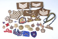 Lot 1452 - A collection of assorted post WW II cloth...