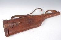 Lot 1522 - An early 20th century brown stitched leather...