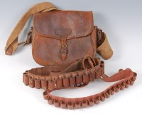 Lot 1530 - A brown stitched leather cartridge bag on a...