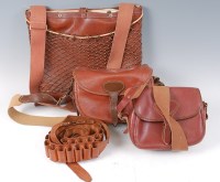 Lot 1531 - A brown stitched leather cartridge bag,...