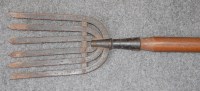 Lot 1541 - A Victorian iron five prong eel spear on a...