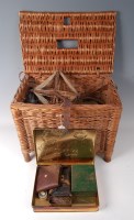 Lot 1546 - A wicker seat box and contents to include...