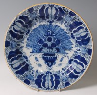 Lot 16 - An 18th century Dutch Delft charger, cobalt...