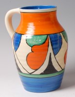 Lot 42 - A Clarice Cliff single handle lotus jug, in...
