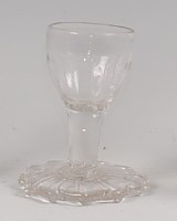 Lot 86 - An 18th century hand-blown firing glass,...