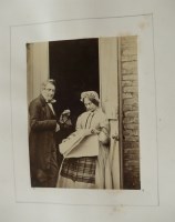 Lot 2142 - A collection of 11 photographs, mounted on A4...