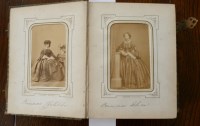 Lot 2158 - A carte de visite album, brass bound, spine...