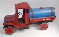 Lot 34 - An early 20th century wooden and pressed metal...