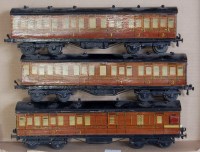 Lot 379 - A small tray containing 2 x Leeds wooden LMS...