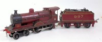 Lot 430 - Marklin maroon 0-4-0 loco with 6 wheel tender...