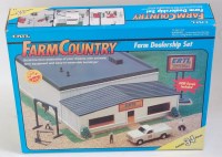 Lot 1202 - An ERTL Farm Country boxed set titled Farm...