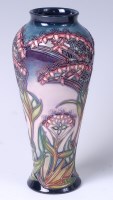 Lot 16 - A Moorcroft pottery vase in the Gypsy pattern,...