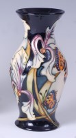 Lot 21 - A Moorcroft pottery vase in the Avalon pattern,...