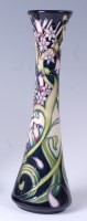 Lot 97 - A Moorcroft pottery vase in the Isis pattern,...