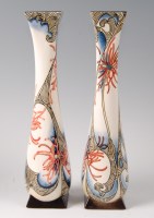 Lot 227 - A pair of limited edition Black Ryden pottery...