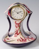 Lot 258 - A Black Ryden pottery clock in the Salsa Swing...