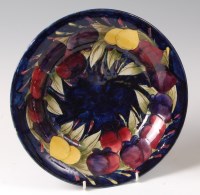 Lot 304 - An early 20th century Moorcroft Plum pattern...