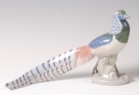 Lot 359 - A Royal Copenhagen porcelain model of an...