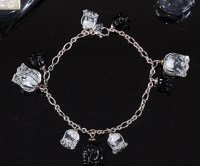 Lot 381 - A Lalique silver and crystal glass charm...