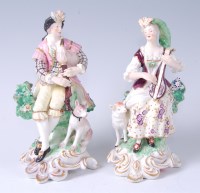 Lot 1054 - A pair of 18th century Derby Shepherd and...