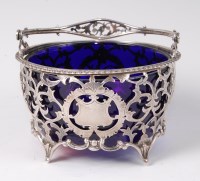 Lot 1093 - An Edwardian silver sweetmeat basket, having...