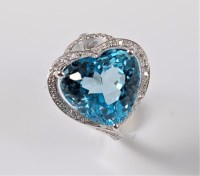 Lot 1154 - A topaz and diamond ring, the horizontally set...