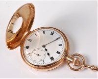Lot 1184 - A 9ct half hunter pocket watch and chain, the...