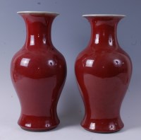 Lot 1287 - A pair of Chinese sang-de-beouf glazed...